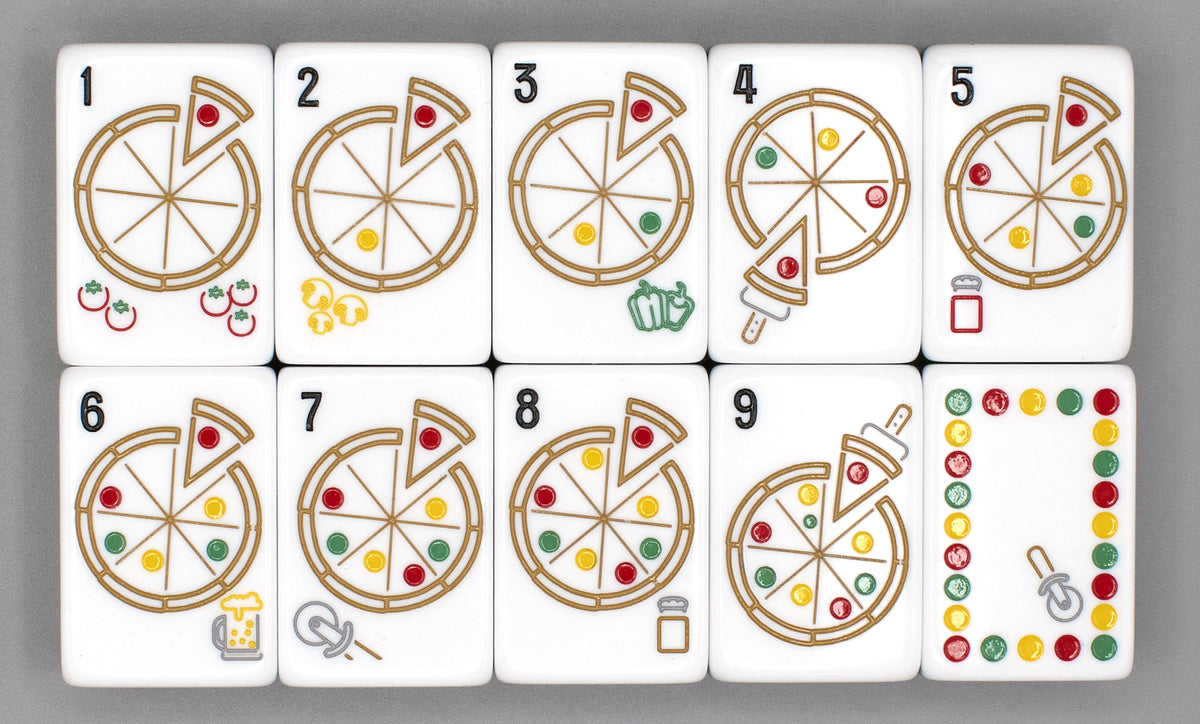 According to NYC tradition, what is the most common way locals eat a slice of pizza on the go?